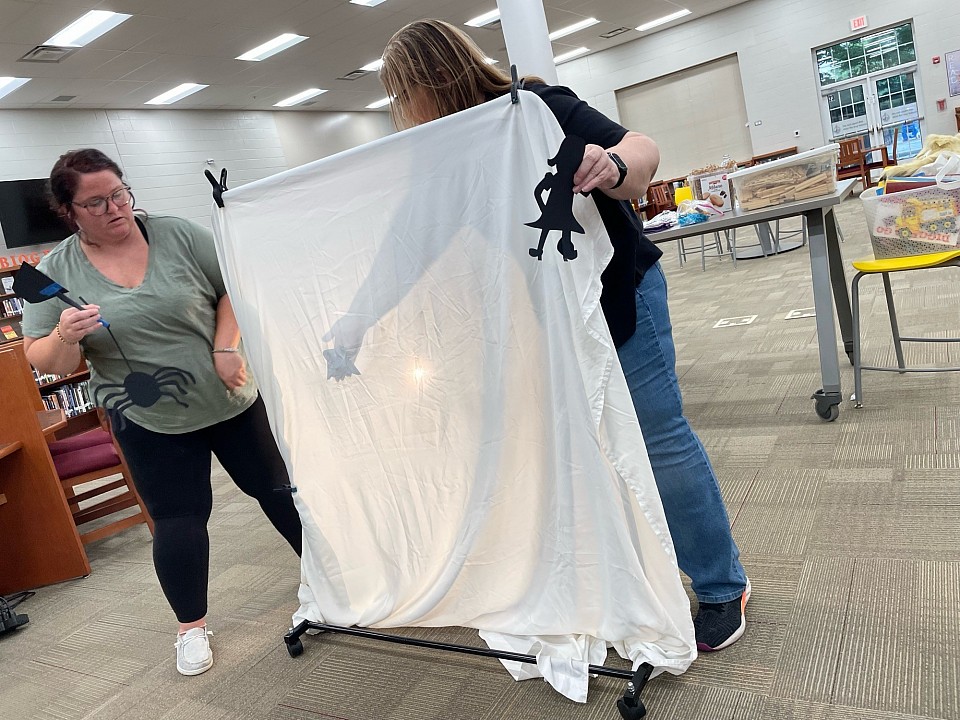 Williamson County School Teachers learning narrative skills through shadow puppet play